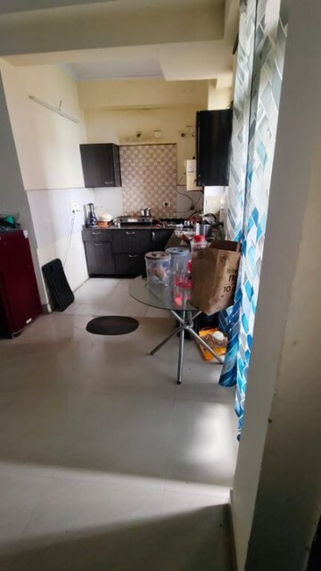 Kitchen in 2 BHK Apartment at Amrapali Princely Estate, Sector 76 – for Rent