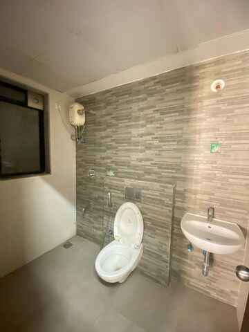 Bathroom in 1.5 BHK Apartment at Lodha Palava Eviva K To T Urbano A C F and I To T, Dombivli East – for Rent