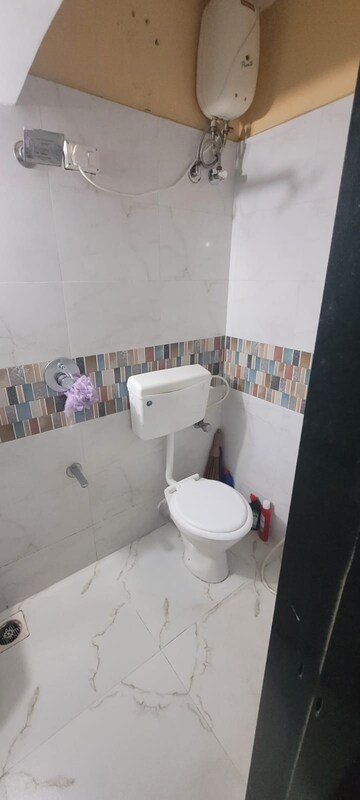 Bathroom in 2 BHK Apartment at Dheeraj Valley, Goregaon East – for Rent