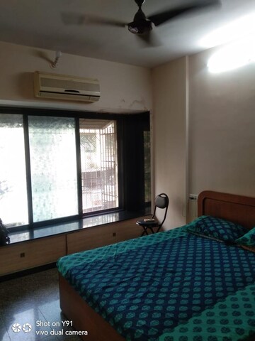 Bedroom in 2 BHK Apartment at Dheeraj Valley, Goregaon East – for Rent