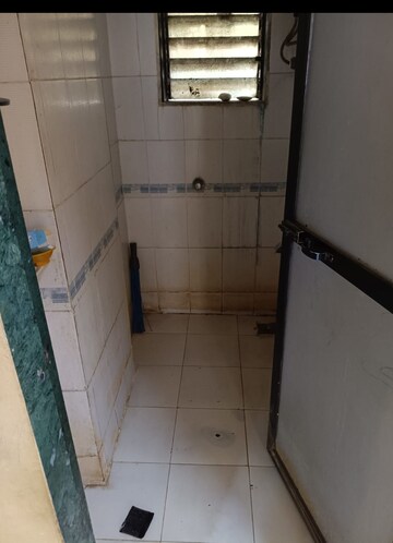 Bathroom in 2 BHK Apartment at Vaibhav Chs Juinagar, Juinagar – for Rent