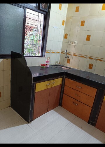 Kitchen in 2 BHK Apartment at Vaibhav Chs Juinagar, Juinagar – for Rent