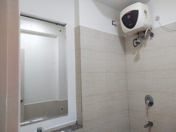 Bathroom in 3 BHK Apartment at Moti Nagar – for Rent