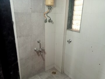 Bathroom in 2 BHK Apartment at Shree Ostwal Orchid, Mira Road – for Rent