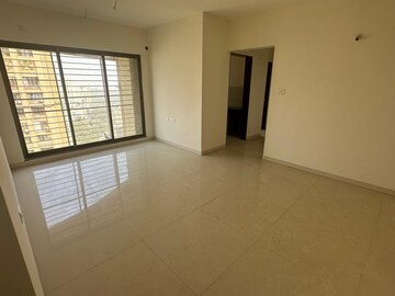 Room in 2 BHK Apartment at Acme Ozone, Manpada – for Sale