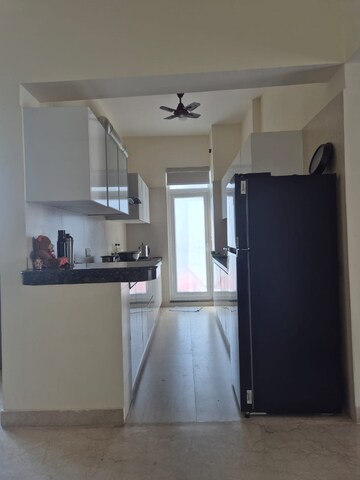 Kitchen in 2.5 BHK Apartment at Microtek Greenburg, Sector 86 – for Rent