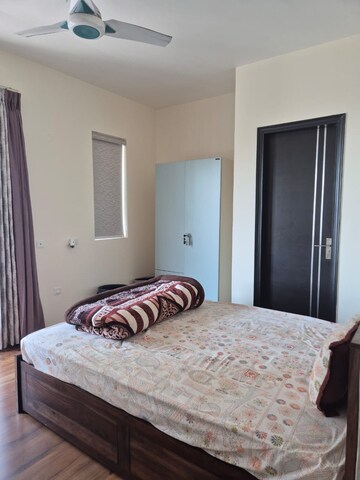 Bedroom in 2.5 BHK Apartment at Microtek Greenburg, Sector 86 – for Rent
