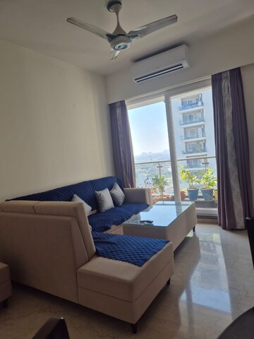 Living Room in 2.5 BHK Apartment at Microtek Greenburg, Sector 86 – for Rent