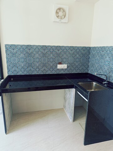 Kitchen in 2 BHK Apartment at Lodha Quality Home Tower 2, Majiwada – for Rent