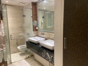 Bathroom in 4 BHK Apartment at Mahagun Mezzaria, Sector 78 – for Rent