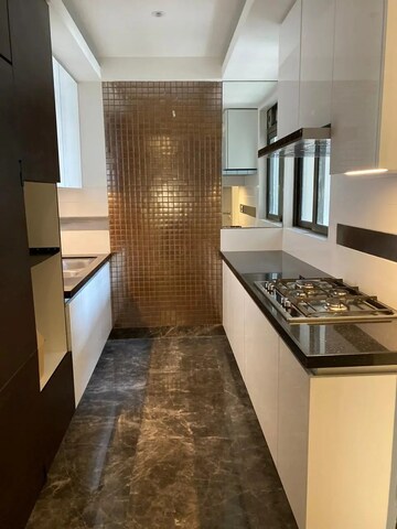 Kitchen in 4 BHK Apartment at Lodha Trump Tower, Worli – for Rent