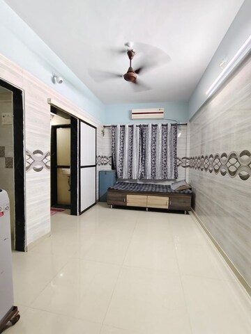 Living Room in 1 BHK Apartment at Suncity Complex, Powai – for Rent
