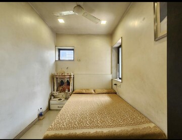 Bedroom in 2 BHK Apartment at Living Essence, Kandivali East – for Sale
