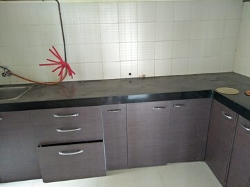 Kitchen in 2 BHK Apartment at Cosmos County II, Ghodbunder Road – for Sale