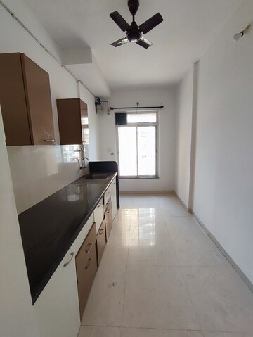 Kitchen in 2 BHK Apartment at Puraniks Kavya Dhara CHS, Dhokali – for Rent