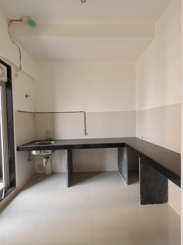 Kitchen in 1 BHK Apartment at Ashar Metro Towers, Vartak Nagar – for Sale