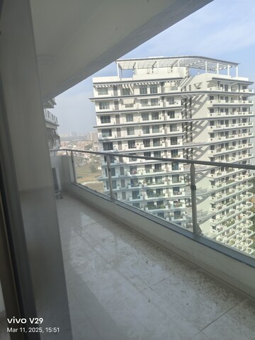 Balcony in 4 BHK Apartment at Tata Raheja Raisina Residency, Sector 59 – for Rent