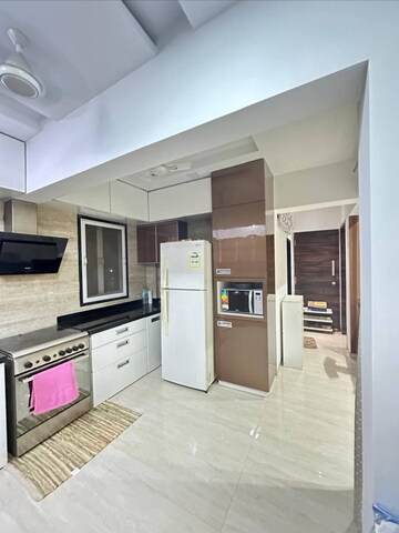 Kitchen in 2.5 BHK Apartment at Juhu Gulmohar CHS, Vile Parle West – for Rent