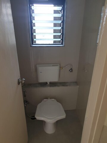 Bathroom in 1 BHK Apartment at Raunak Delight, Owale – for Rent