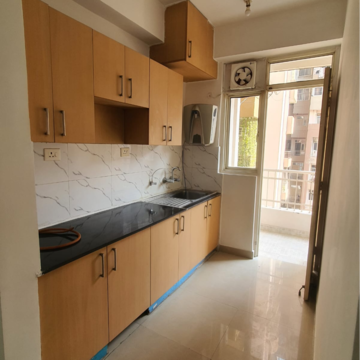 Kitchen in 2.5 BHK Apartment at Supertech Cape Town, Sector 74 – for Rent
