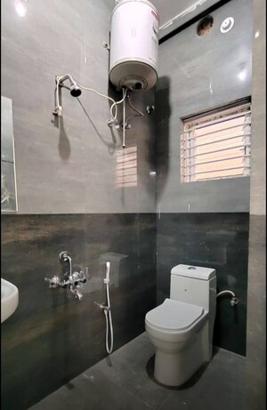 Bathroom in 2 BHK Builder Floor at Queens Manor Apartment, Shivaji Nagar – for Rent