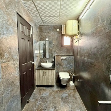 Bathroom in 2.5 BHK Apartment at Golden Sand Apartments, Dhakoli Village – for Rent