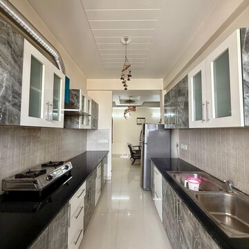 Kitchen in 2.5 BHK Apartment at Golden Sand Apartments, Dhakoli Village – for Rent