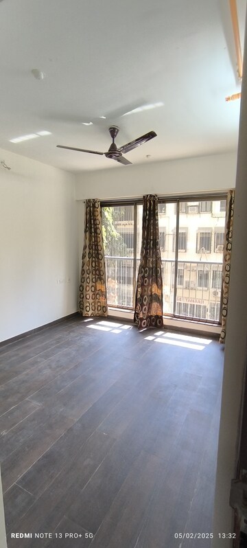 Room in 2 BHK Apartment at Romell Amore, Andheri West – for Rent