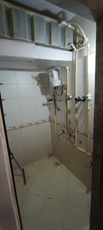 Bathroom in 1 BHK Apartment at Shreedham Millenium Shastri Nagar, Goregaon West – for Rent