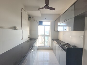 Kitchen in 1.5 BHK Apartment at Godrej Emerald, Ghodbunder Road – for Rent