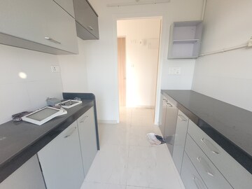 Kitchen in 1.5 BHK Apartment at Godrej Emerald, Ghodbunder Road – for Rent