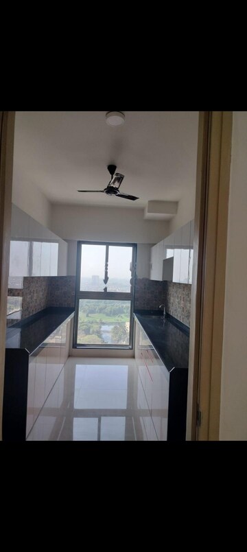 Kitchen in 2 BHK Apartment at Rajesh Raj Infinia, Malad West – for Rent
