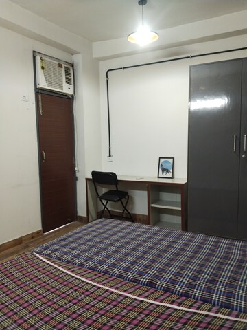 Bedroom in 2 BHK Builder Floor at Ansal Plaza Sector-23, Sector 23 – for Rent