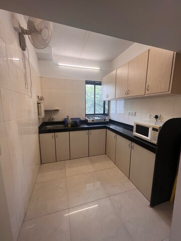 Kitchen in 2 BHK Apartment at Gold Coins, Tardeo – for Rent