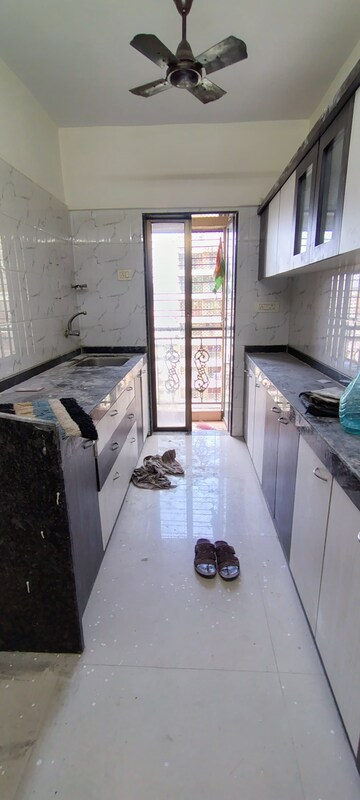 Kitchen in 2 BHK Apartment at Neminath Heights, Mira Road – for Rent