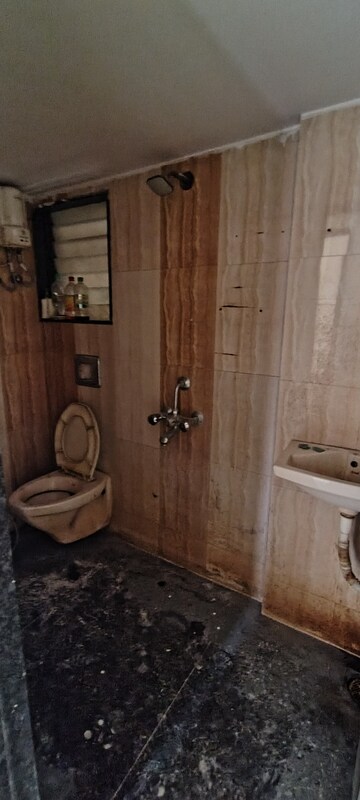 Bathroom in 2 BHK Apartment at Neminath Heights, Mira Road – for Rent