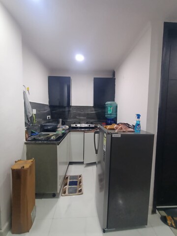 Kitchen in 2 BHK Builder Floor at Freedom Fighters Enclave – for Rent