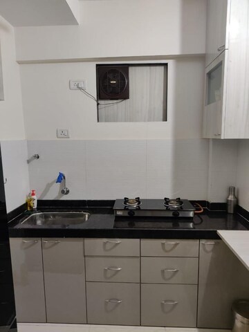 Kitchen in 1 BHK Apartment at Squarefeet Joy square, Kasarvadavali – for Rent