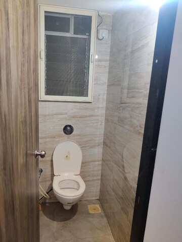 Bathroom in 1 BHK Apartment at Squarefeet Joy square, Kasarvadavali – for Rent