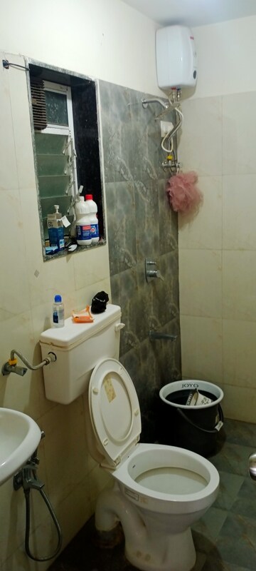 Bathroom in 1 BHK Apartment at Bindra Complex, Andheri East – for Rent