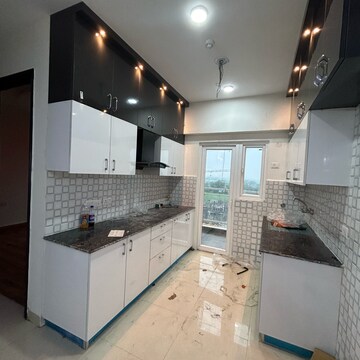 Kitchen in 2 BHK Apartment at Samridhi Luxuriya Avenue, Sector 150 – for Rent