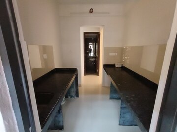 Living Room in 2 BHK Apartment at Lodha Palava Downtown, Dombivli East – for Sale
