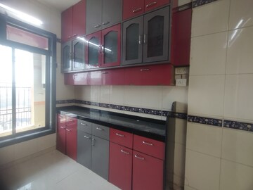 Kitchen in 3 BHK Apartment at Nandidham CHS, Seawoods – for Rent