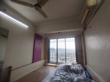 Bedroom in 3 BHK Apartment at Nandidham CHS, Seawoods – for Rent