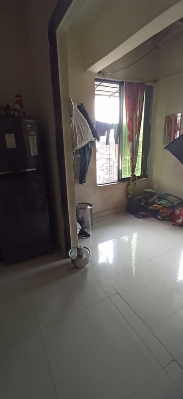 Living Room in 1 BHK Apartment at Koproli – for Sale
