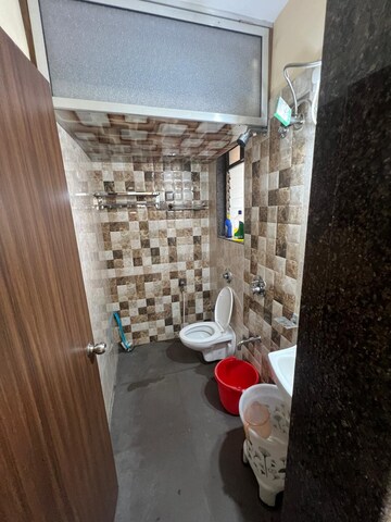 Bathroom in 1 BHK Apartment at Right Aabiel Avenue, Malad West – for Rent