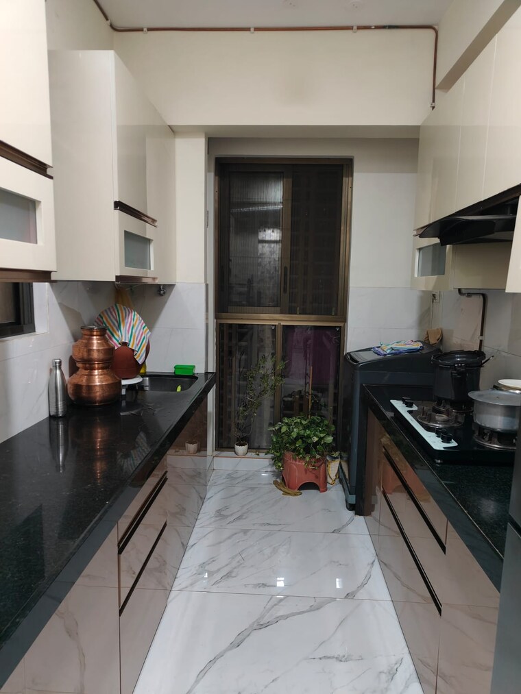 Kitchen, raymond-ten-x-habitat 2 Bedroom 560 Sq.Ft. Apartment In Pokhran Road No Two Thane 8337601