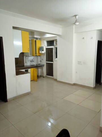 Kitchen in 2.5 BHK Apartment at Exotica Dreamville, Sector 16c Greater Noida – for Rent