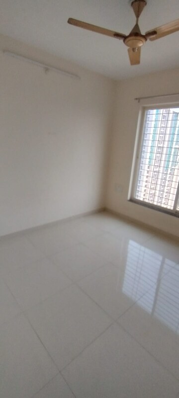 Room in 2 BHK Apartment at 5 Star Royal Grande, Wakad – for Rent
