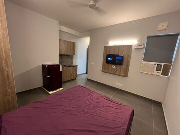 Bedroom in 1 RK Apartment at Genex Apartments, Dlf City Phase 3 – for Rent